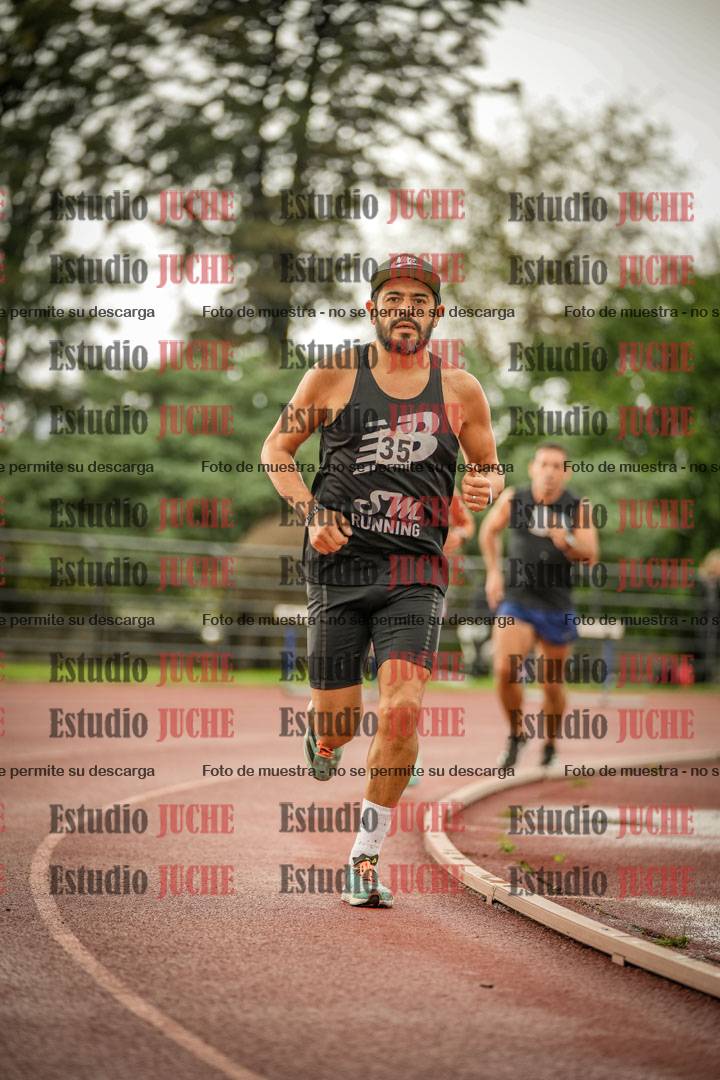 Fotos de los 5000 m de mujeres y varones - serie 3