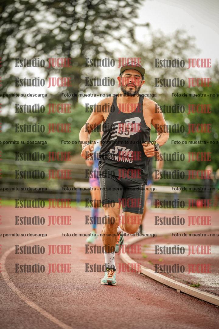 Fotos de los 5000 m de mujeres y varones - serie 3