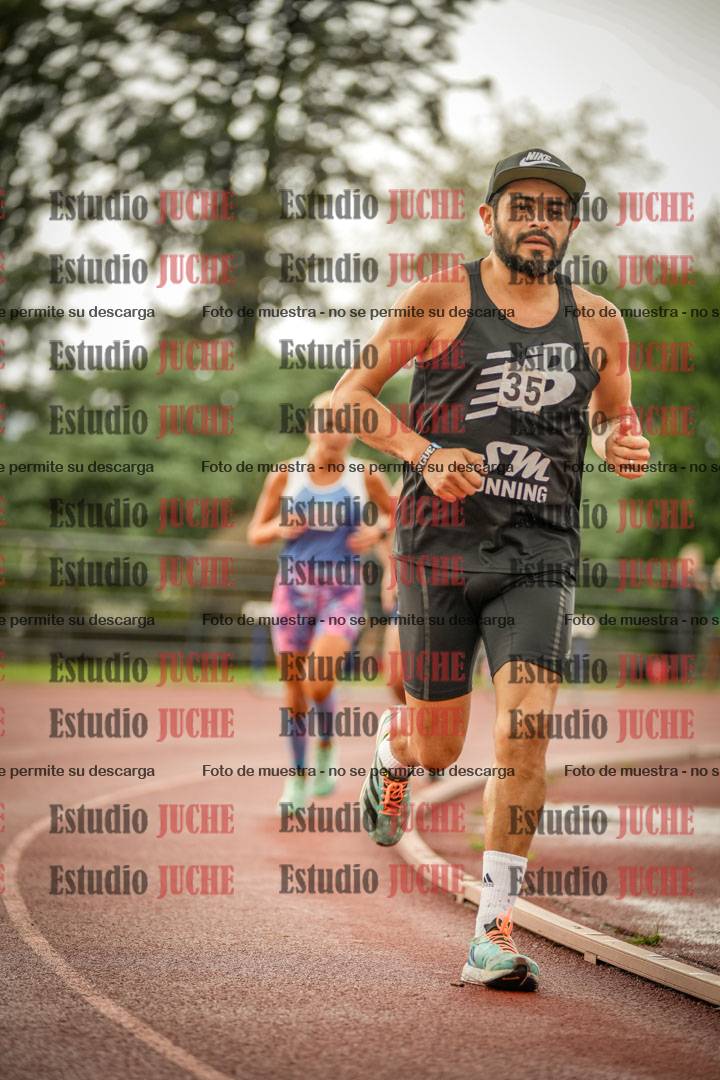 Fotos de los 5000 m de mujeres y varones - serie 3