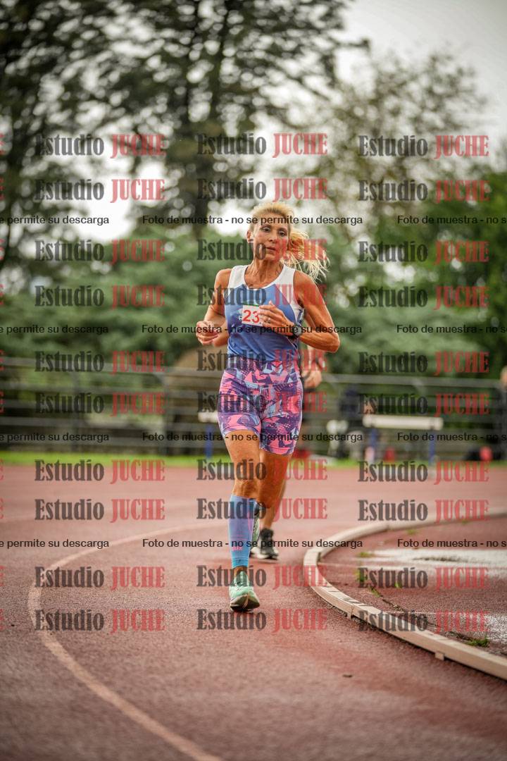 Fotos de los 5000 m de mujeres y varones - serie 3