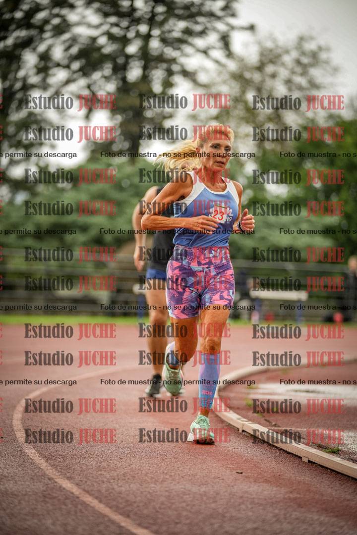 Fotos de los 5000 m de mujeres y varones - serie 3