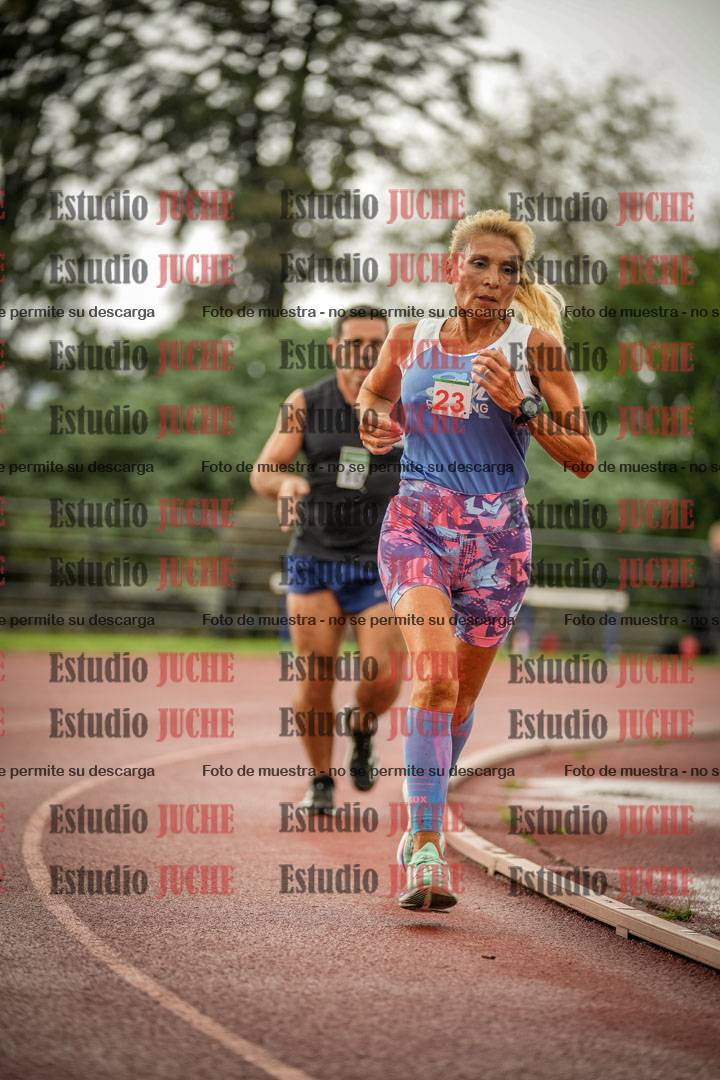 Fotos de los 5000 m de mujeres y varones - serie 3