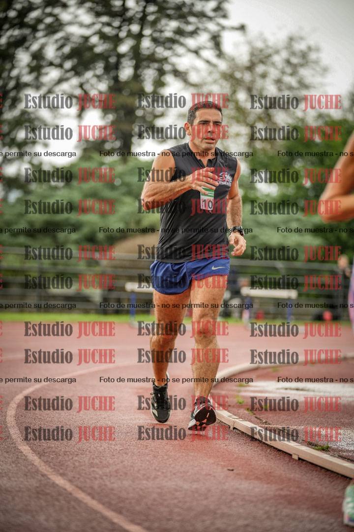 Fotos de los 5000 m de mujeres y varones - serie 3