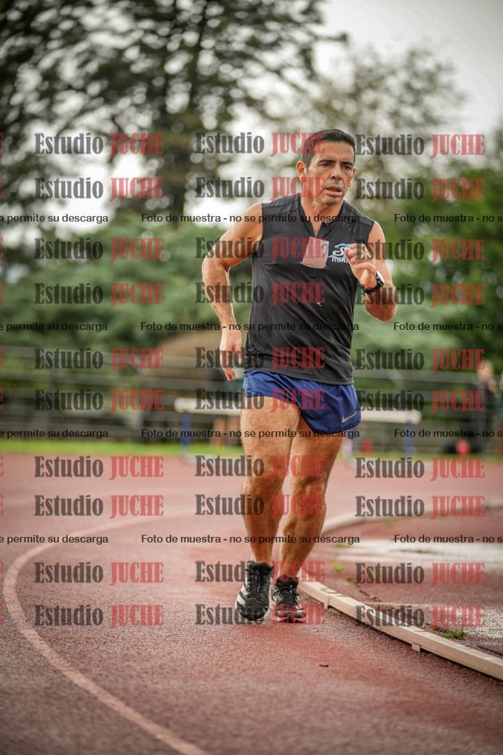 Fotos de los 5000 m de mujeres y varones - serie 3