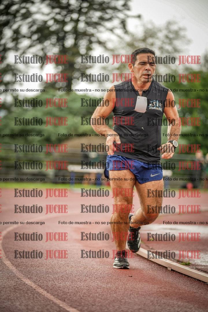 Fotos de los 5000 m de mujeres y varones - serie 3