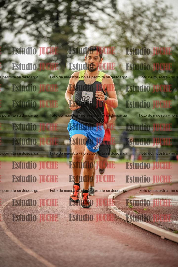 Fotos de los 5000 m de mujeres y varones - serie 3