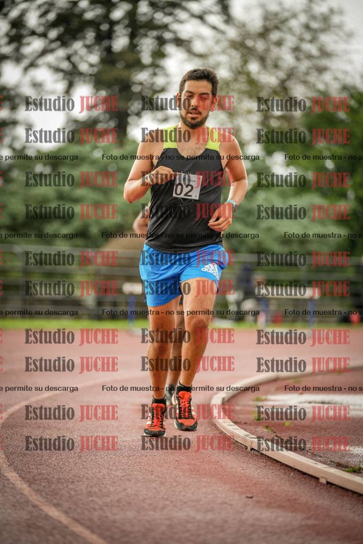 Fotos de los 5000 m de mujeres y varones - serie 3