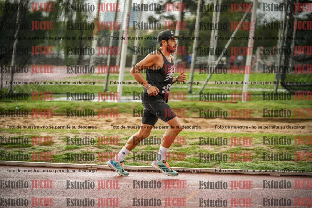 Fotos de los 5000 m de mujeres y varones - serie 3