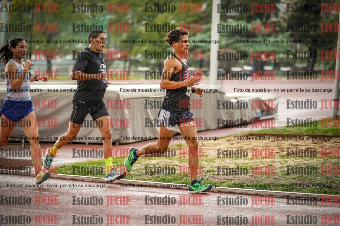 Fotos de los 5000 m de mujeres y varones - serie 3