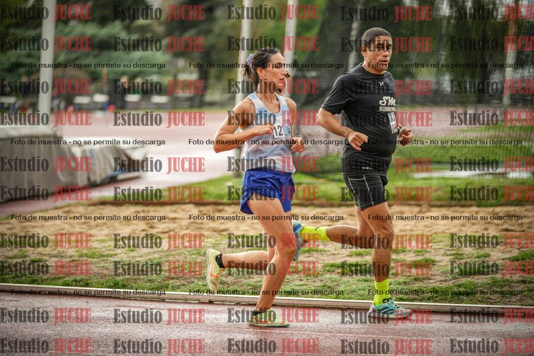 Fotos de los 5000 m de mujeres y varones - serie 3