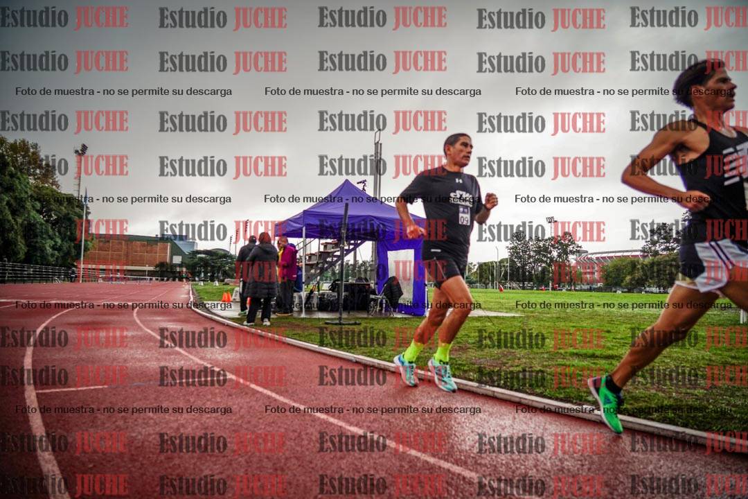 Fotos de los 5000 m de mujeres y varones - serie 3