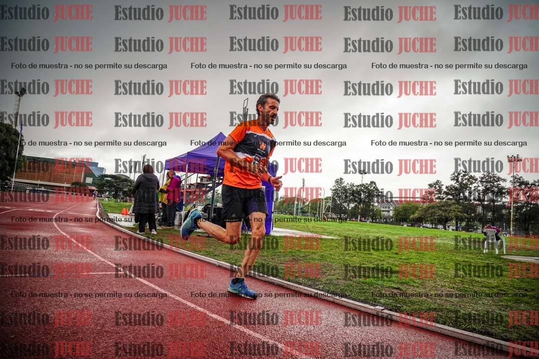 Fotos de los 5000 m de mujeres y varones - serie 3