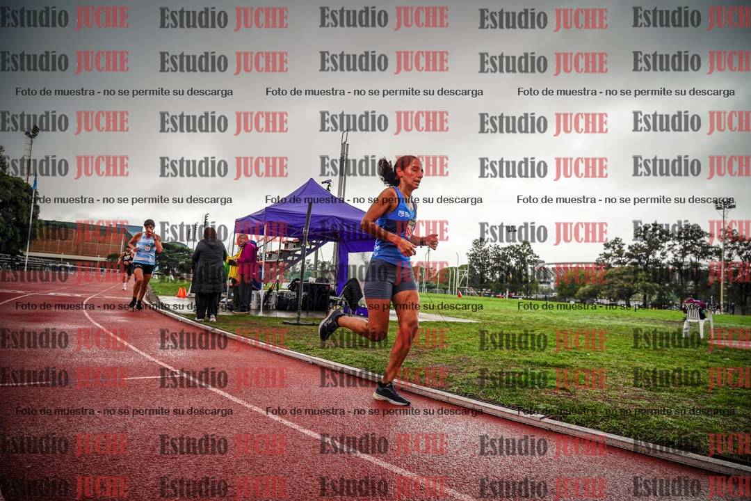 Fotos de los 5000 m de mujeres y varones - serie 3