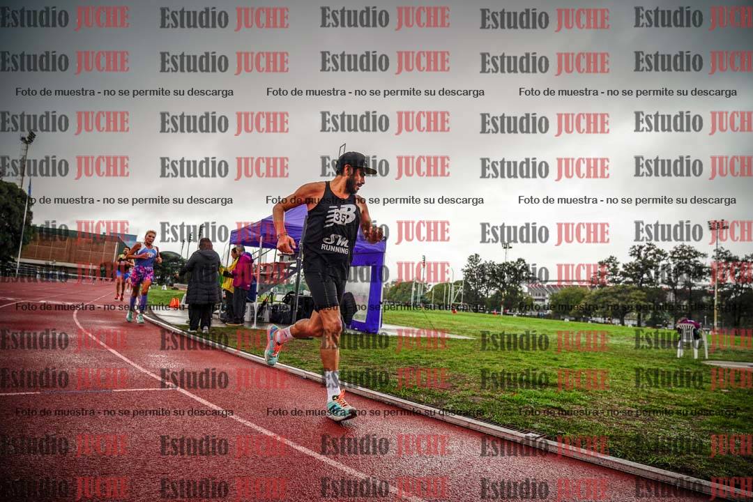 Fotos de los 5000 m de mujeres y varones - serie 3