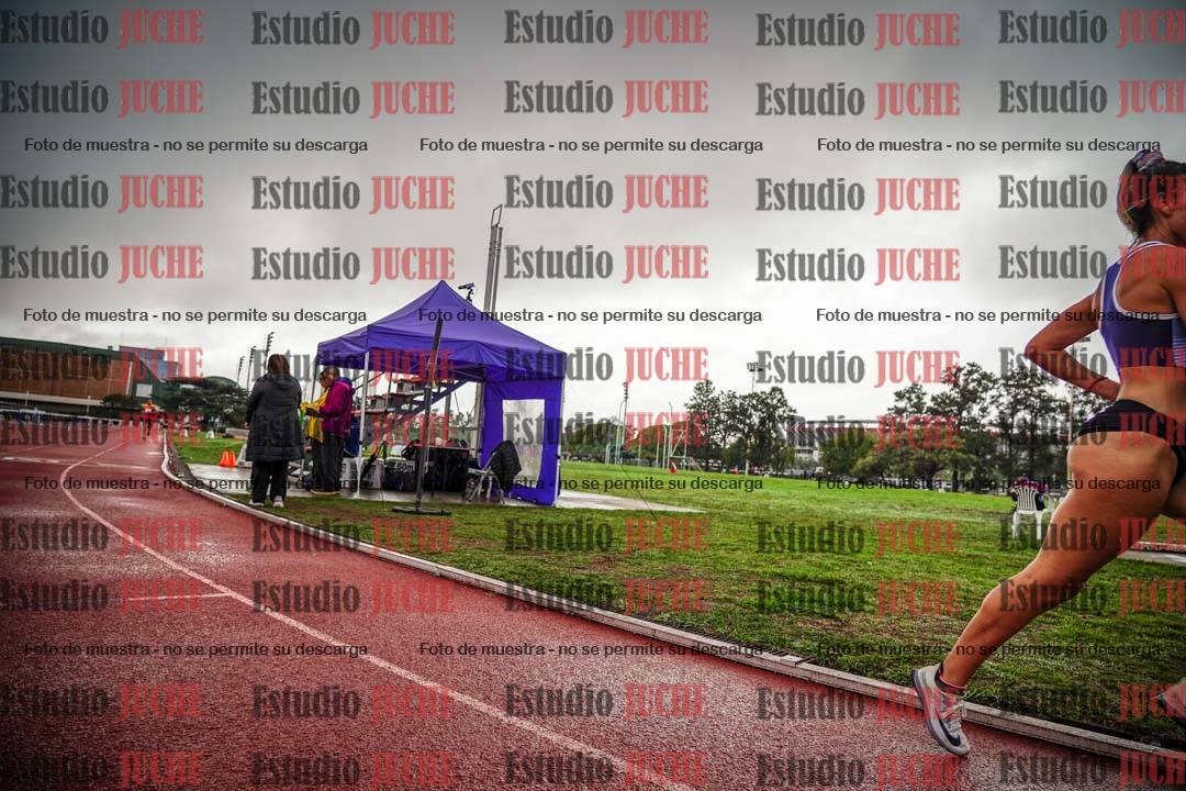 Fotos de los 5000 m de mujeres y varones - serie 3