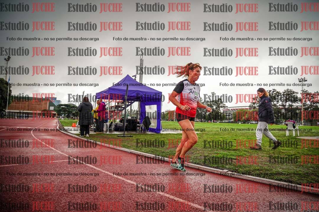 Fotos de los 5000 m de mujeres y varones - serie 3