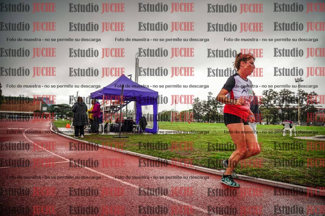 Fotos de los 5000 m de mujeres y varones - serie 3