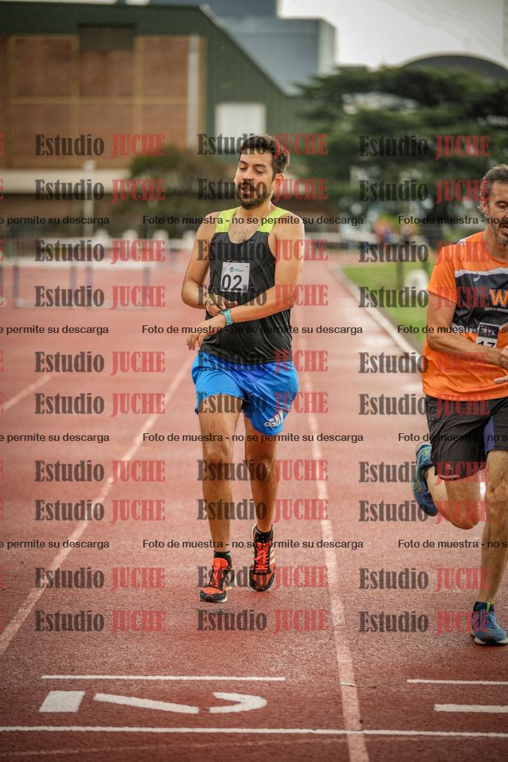 Fotos de los 5000 m de mujeres y varones - serie 3