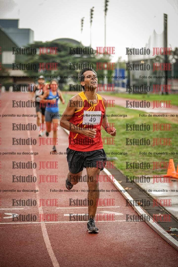 Fotos de los 5000 m de mujeres y varones - serie 3