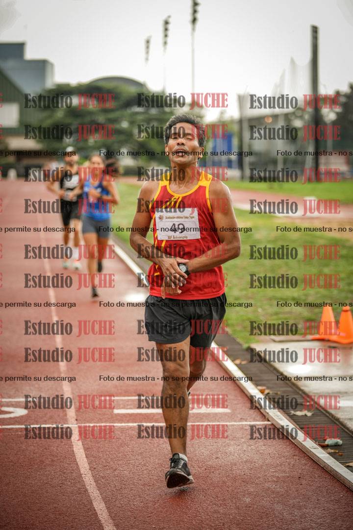 Fotos de los 5000 m de mujeres y varones - serie 3
