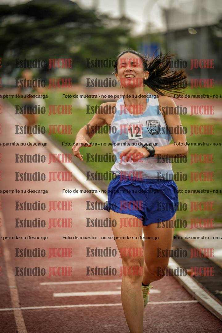 Fotos de los 5000 m de mujeres y varones - serie 3