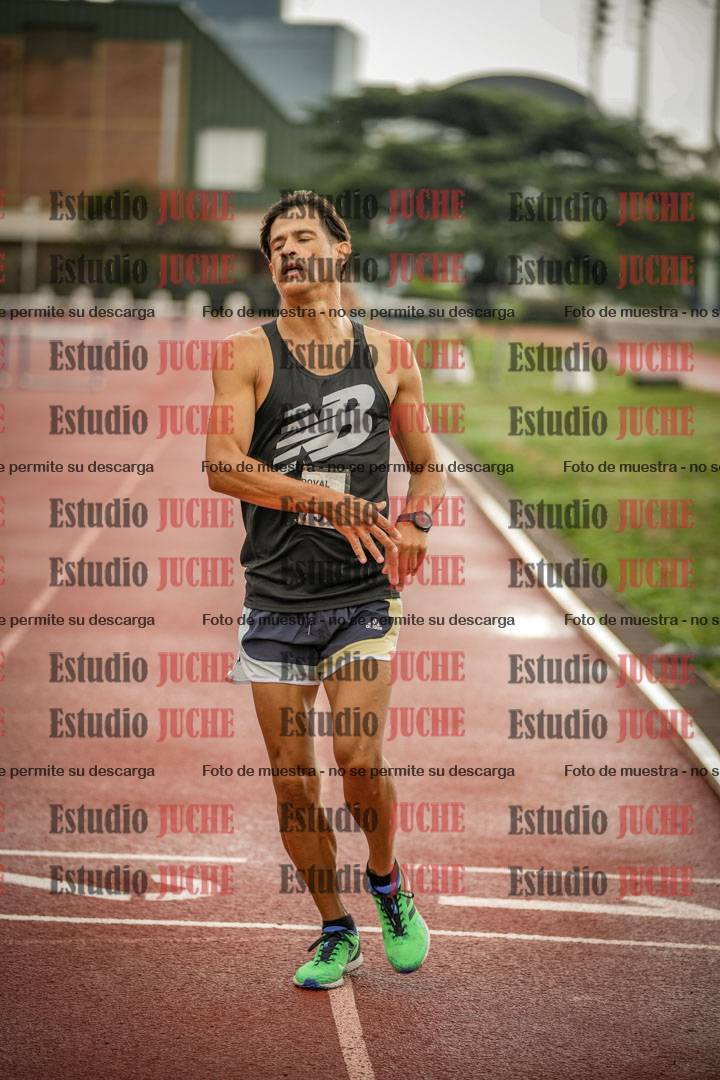 Fotos de los 5000 m de mujeres y varones - serie 3