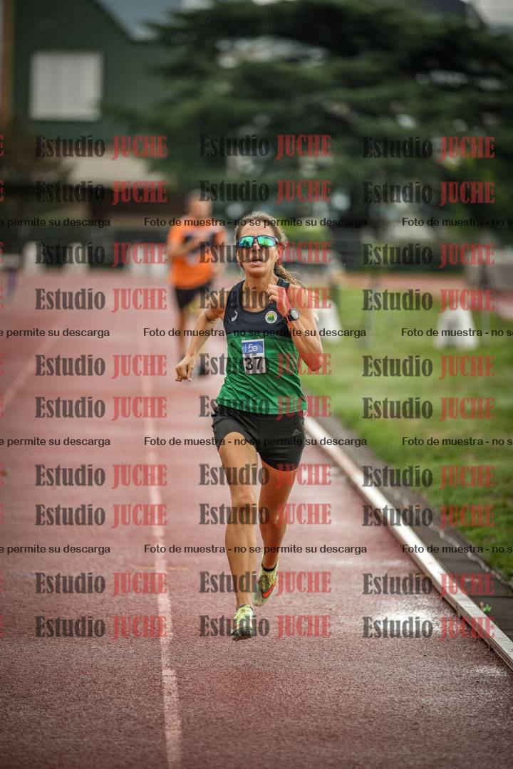 Fotos de los 5000 m de mujeres y varones - serie 3