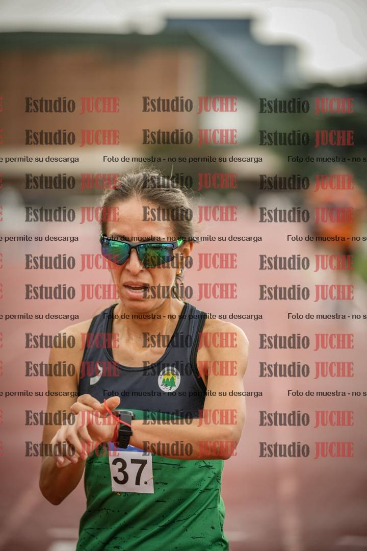 Fotos de los 5000 m de mujeres y varones - serie 3