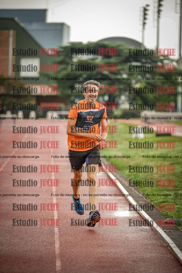 Fotos de los 5000 m de mujeres y varones - serie 3