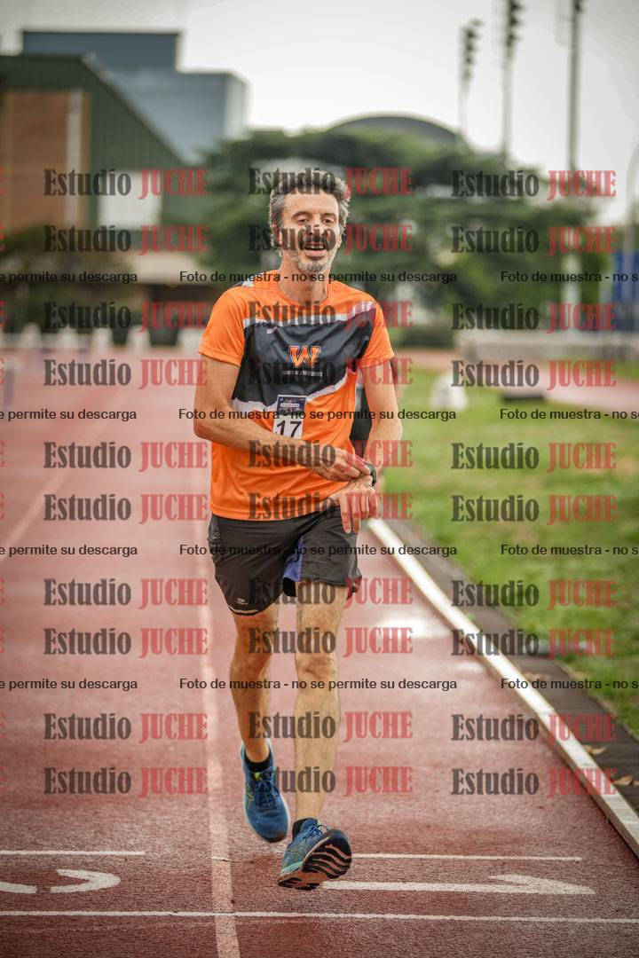 Fotos de los 5000 m de mujeres y varones - serie 3