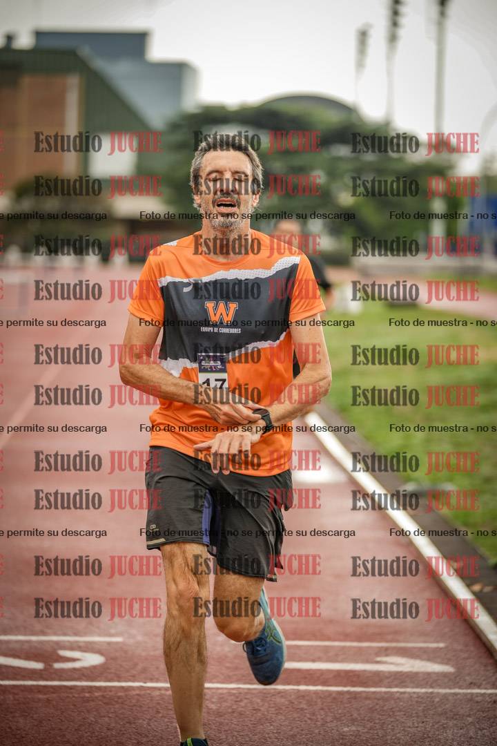 Fotos de los 5000 m de mujeres y varones - serie 3
