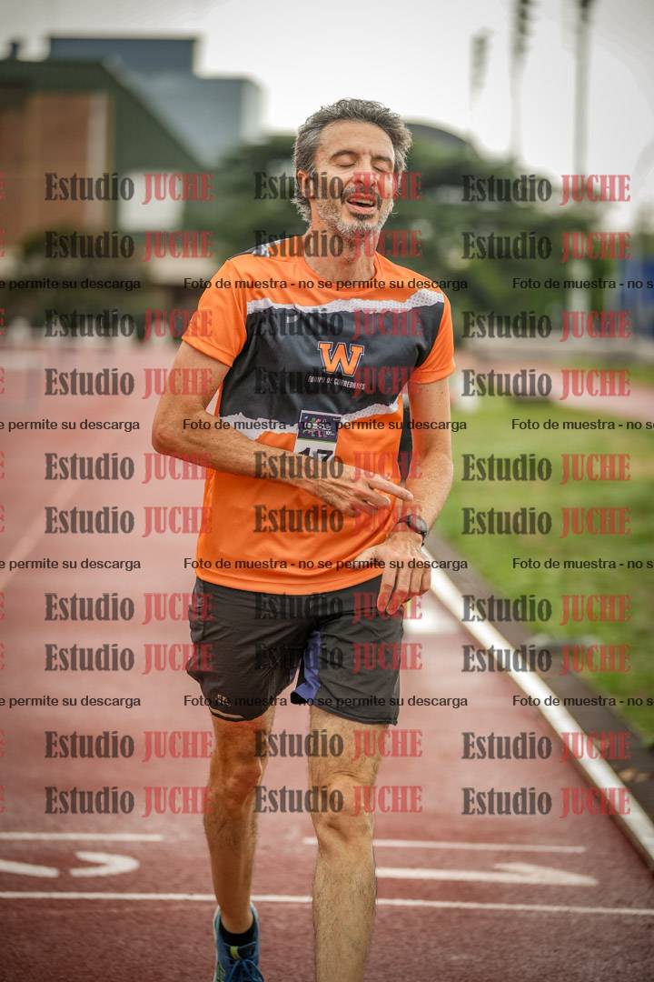 Fotos de los 5000 m de mujeres y varones - serie 3