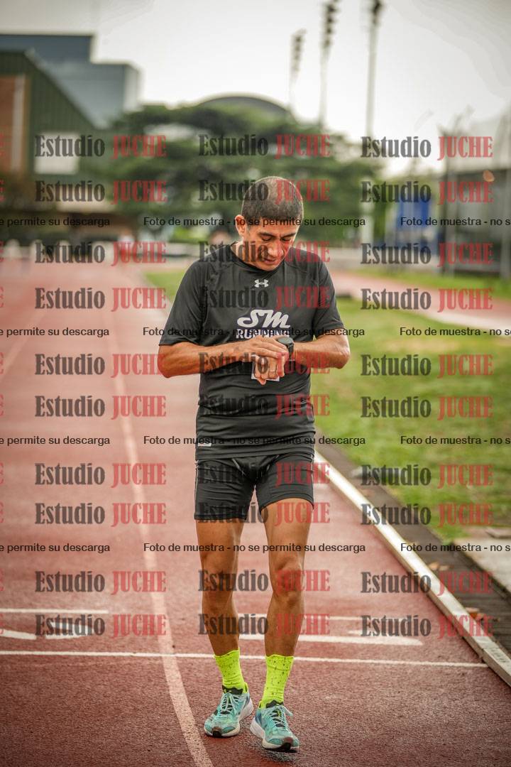 Fotos de los 5000 m de mujeres y varones - serie 3
