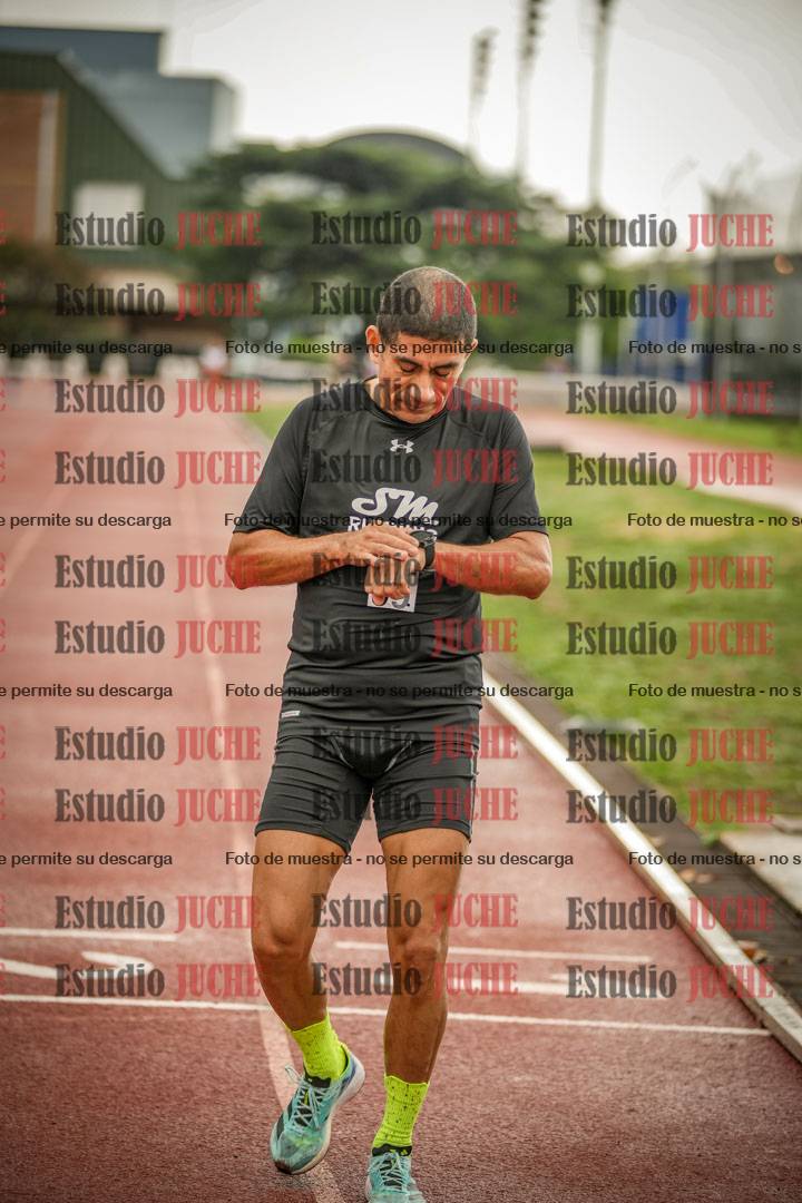 Fotos de los 5000 m de mujeres y varones - serie 3