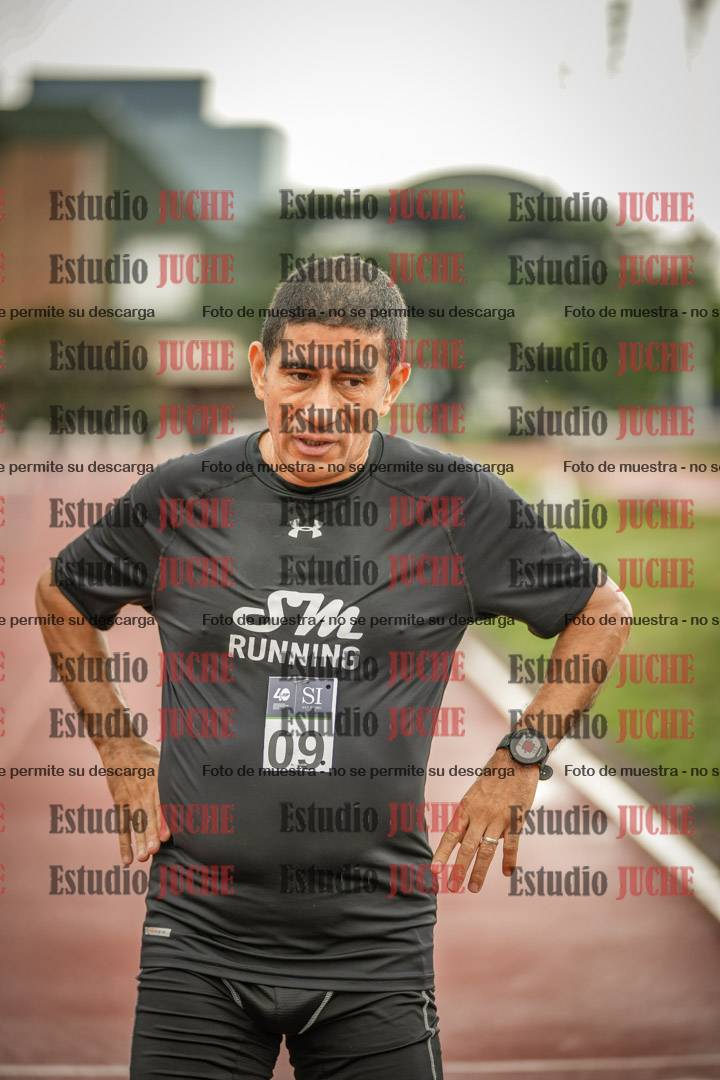 Fotos de los 5000 m de mujeres y varones - serie 3