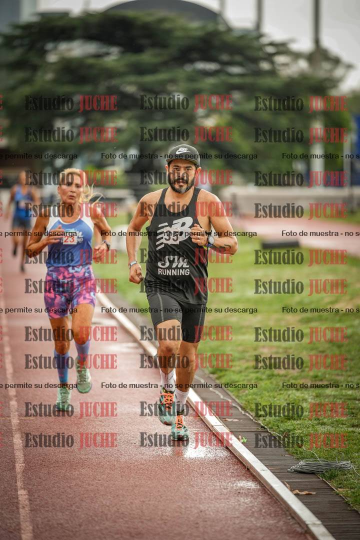 Fotos de los 5000 m de mujeres y varones - serie 3