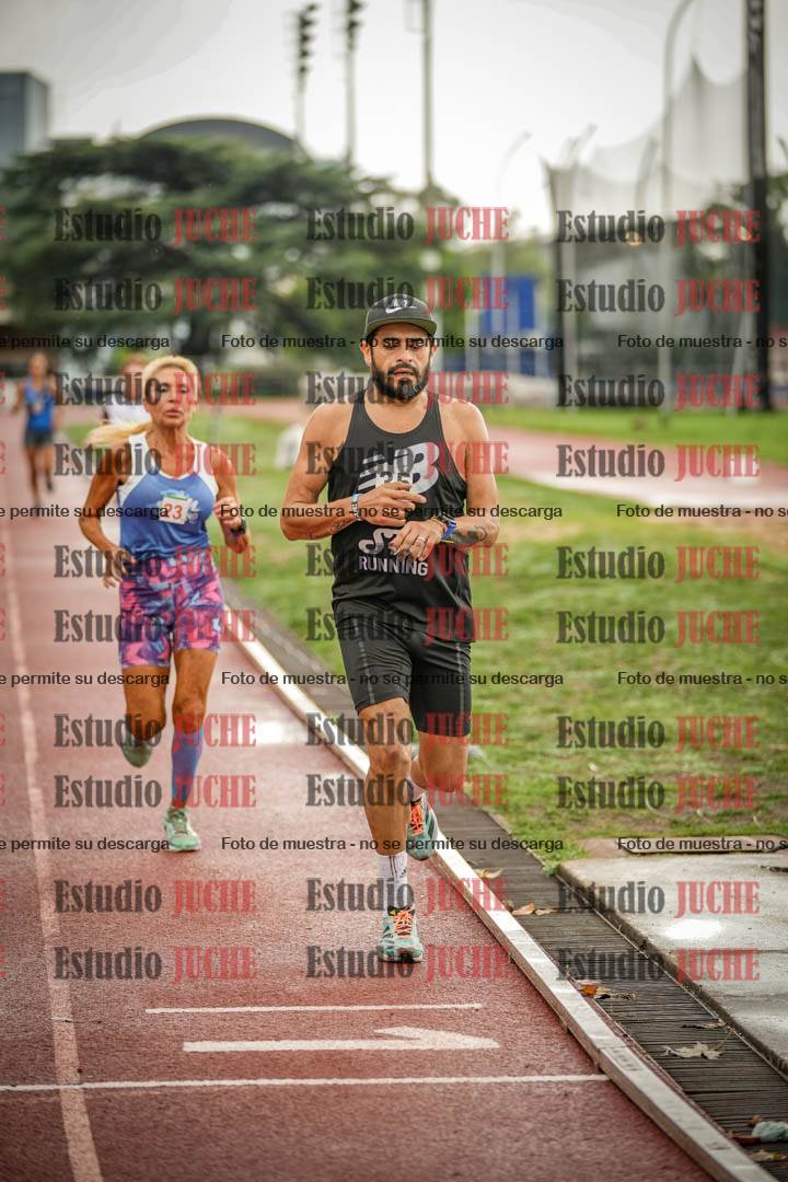 Fotos de los 5000 m de mujeres y varones - serie 3