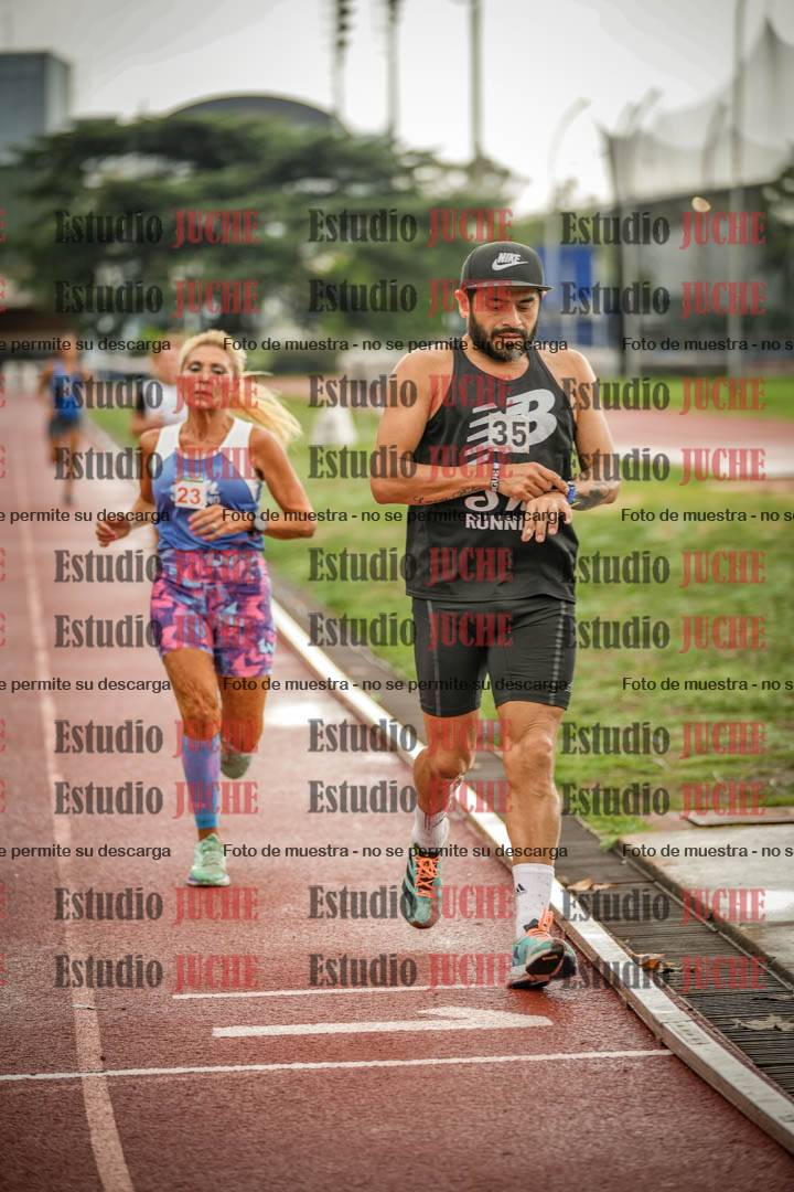 Fotos de los 5000 m de mujeres y varones - serie 3