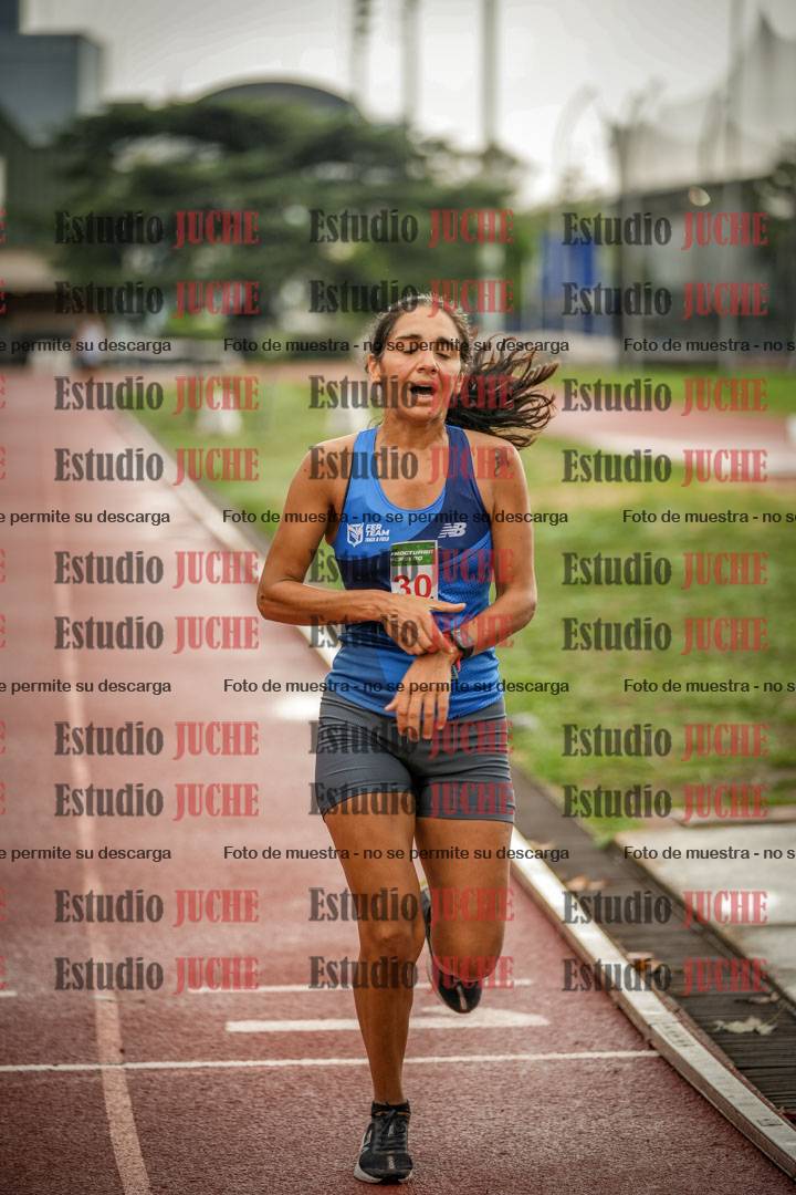 Fotos de los 5000 m de mujeres y varones - serie 3