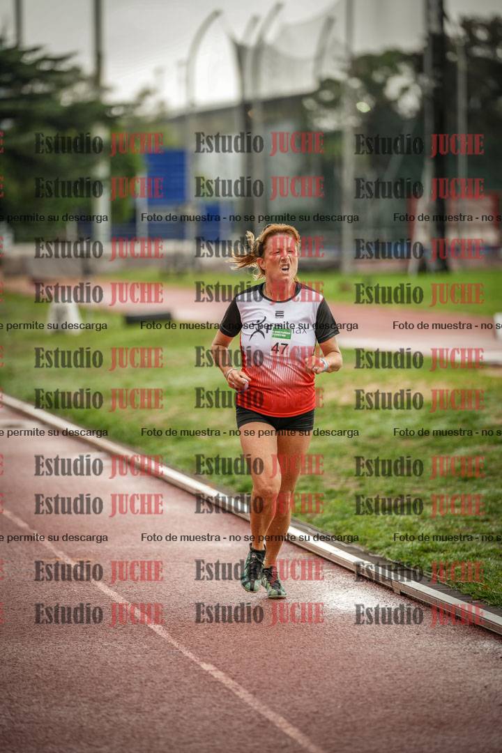 Fotos de los 5000 m de mujeres y varones - serie 3