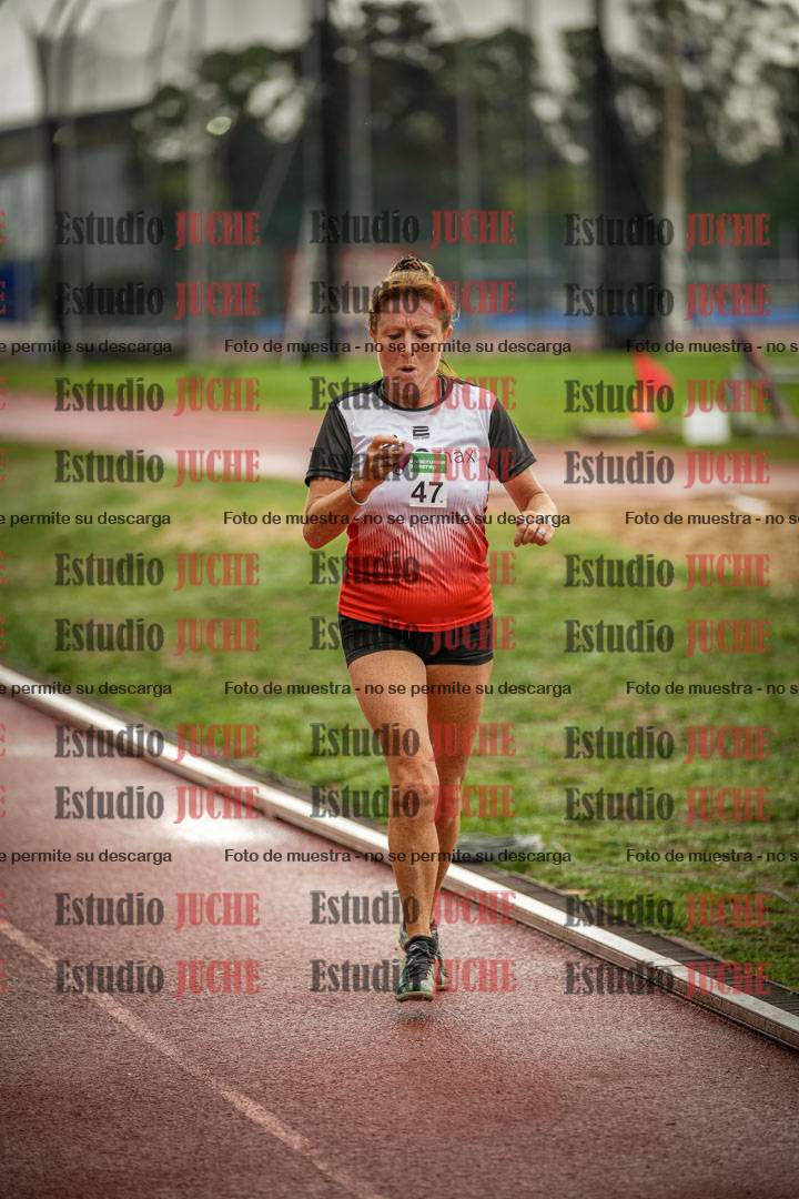 Fotos de los 5000 m de mujeres y varones - serie 3