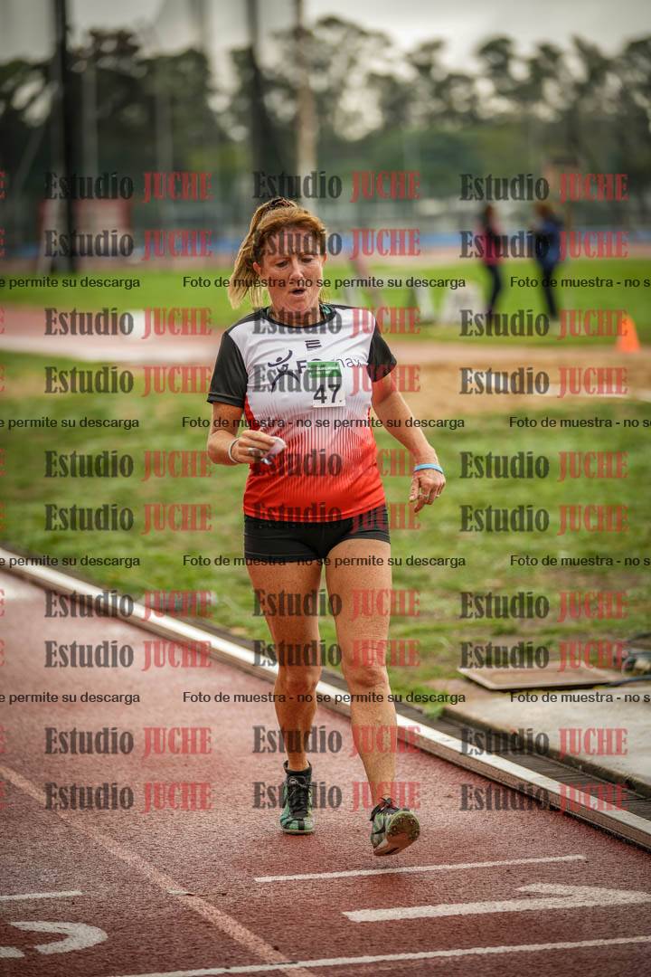 Fotos de los 5000 m de mujeres y varones - serie 3