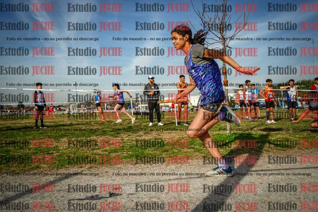 Fotos en el primer relevo (1000 m de carrera)