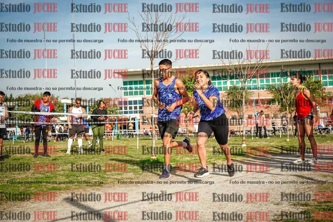 Fotos en el primer relevo (1000 m de carrera)