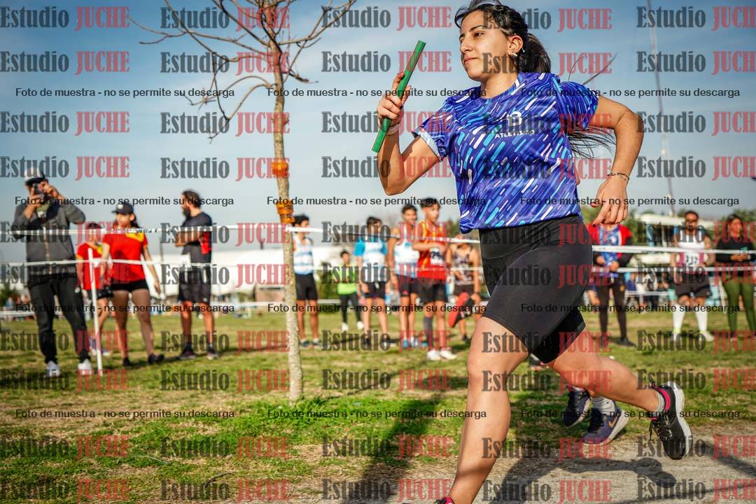 Fotos en el primer relevo (1000 m de carrera)