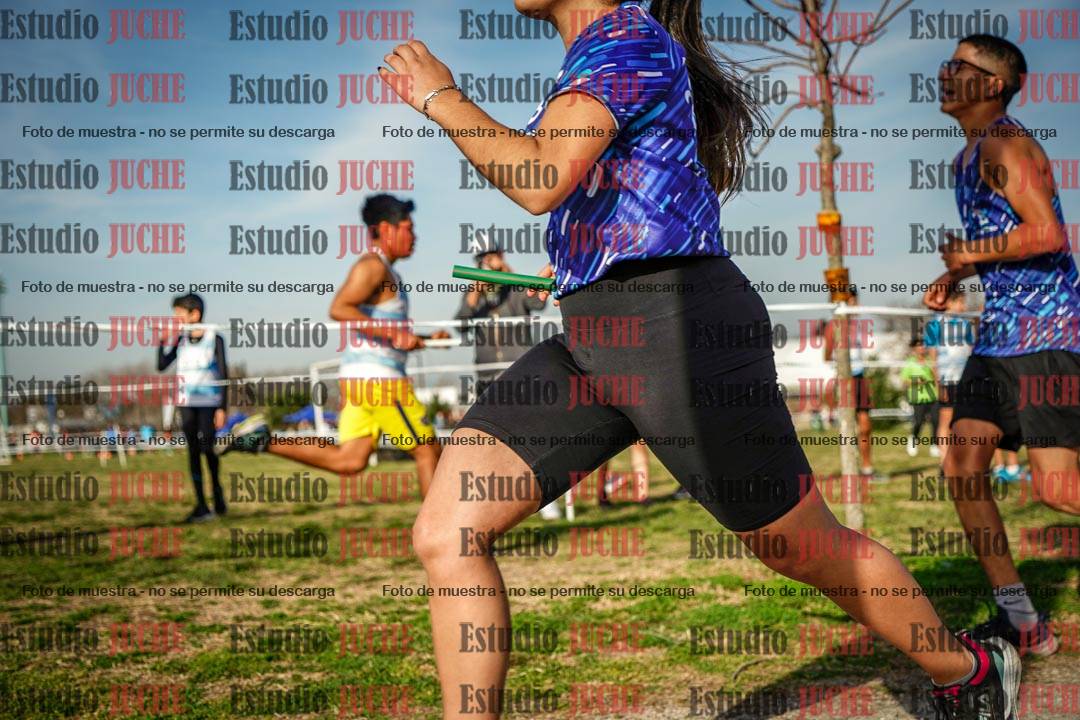 Fotos en el primer relevo (1000 m de carrera)