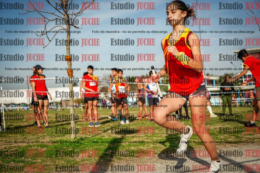 Fotos en el primer relevo (1000 m de carrera)