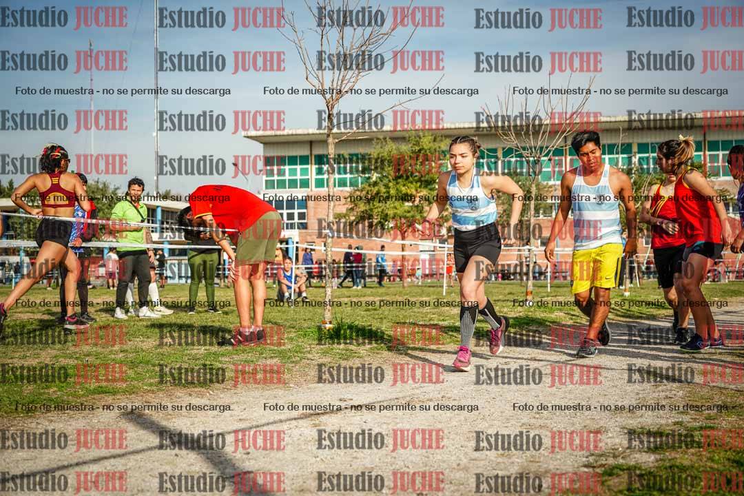 Fotos en el primer relevo (1000 m de carrera)