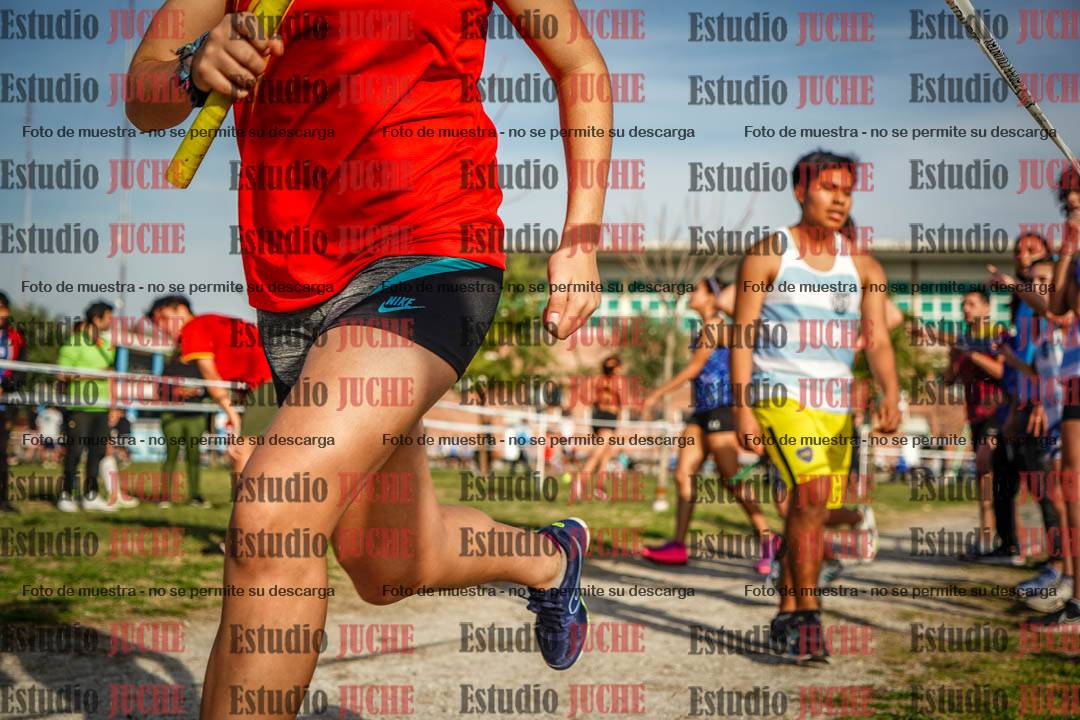 Fotos en el primer relevo (1000 m de carrera)