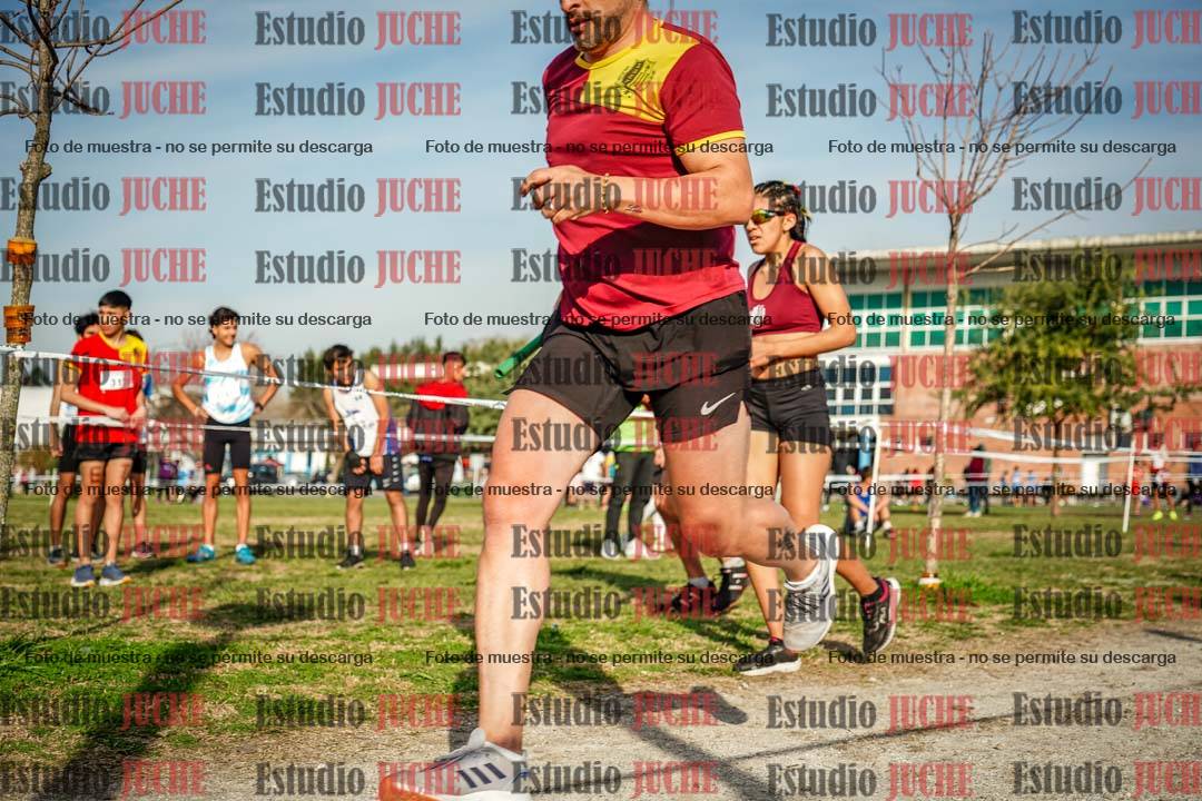 Fotos en el primer relevo (1000 m de carrera)